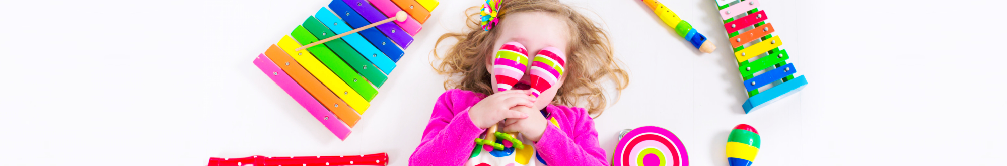 little girl covering her face